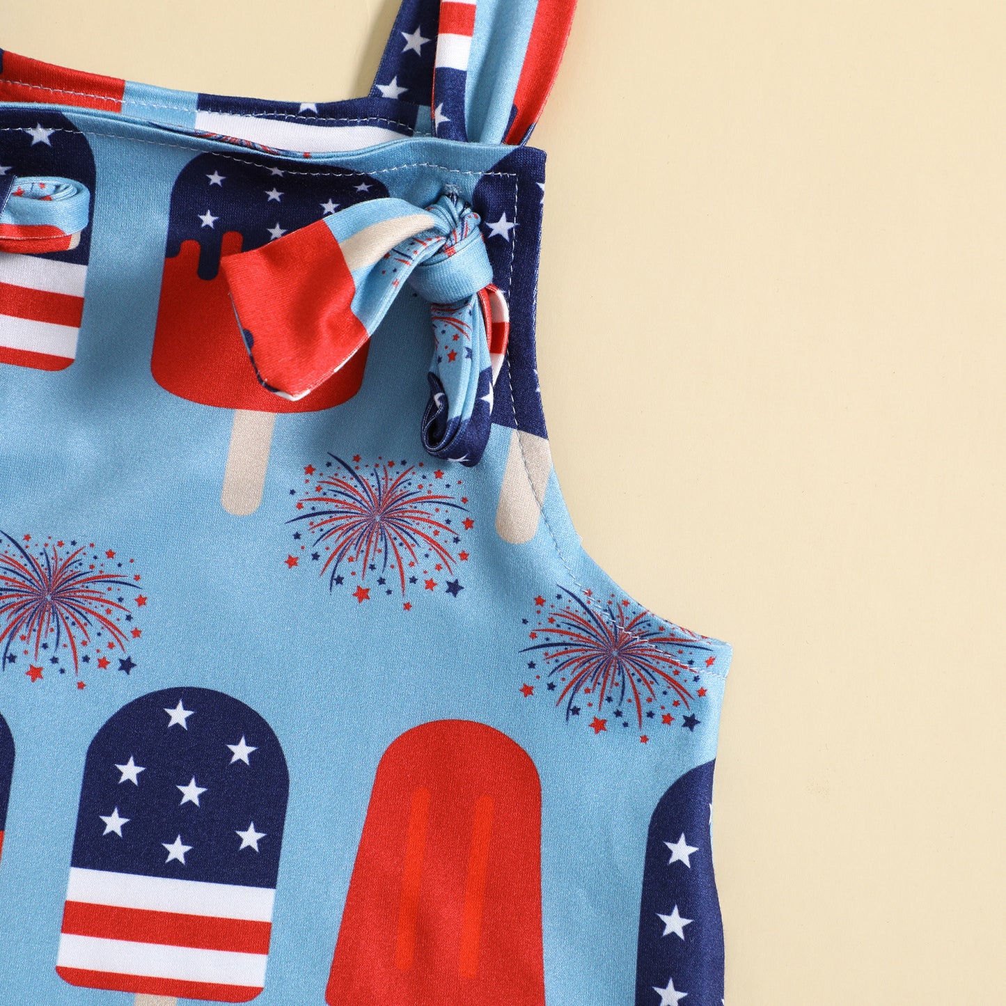 Playful Printed Suspender Baby Romper – Knot Front Detail