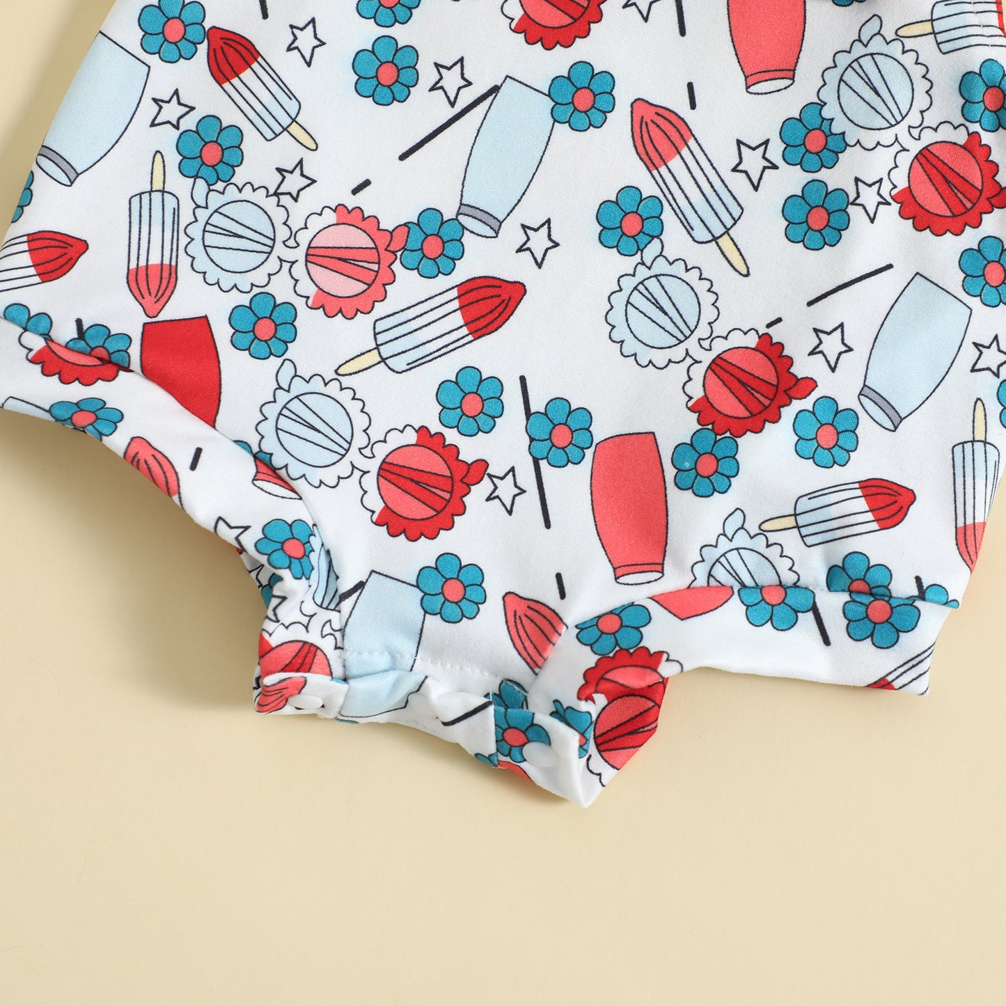 Playful Printed Suspender Baby Romper – Knot Front Detail
